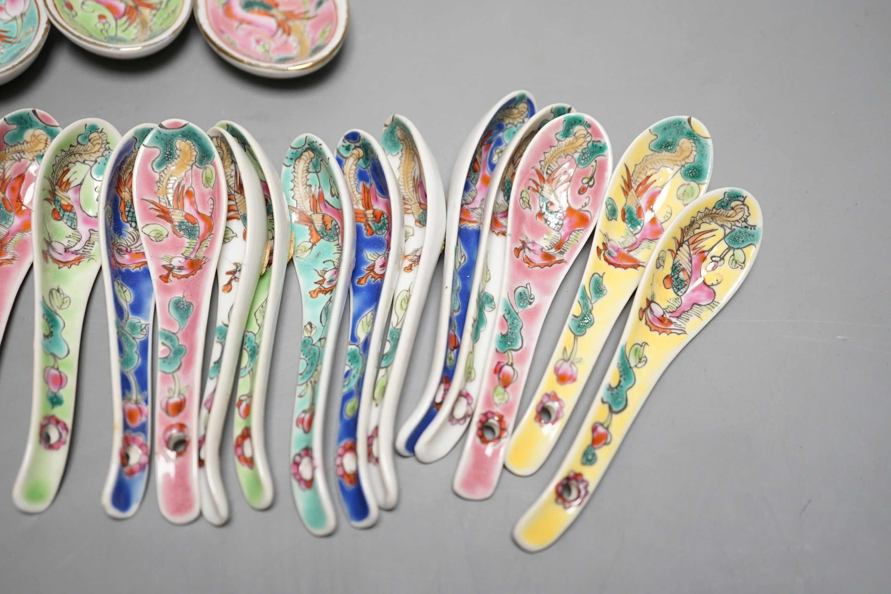 A collection of Chinese Straits porcelain spoons and a dish